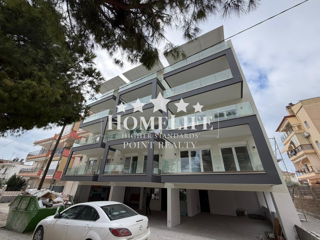 One-bedroom maisonette in a newly built building in Nea Kallikratia-0 Мезонет с една спалня в новопостроена сграда в Неа Каликратия - 0